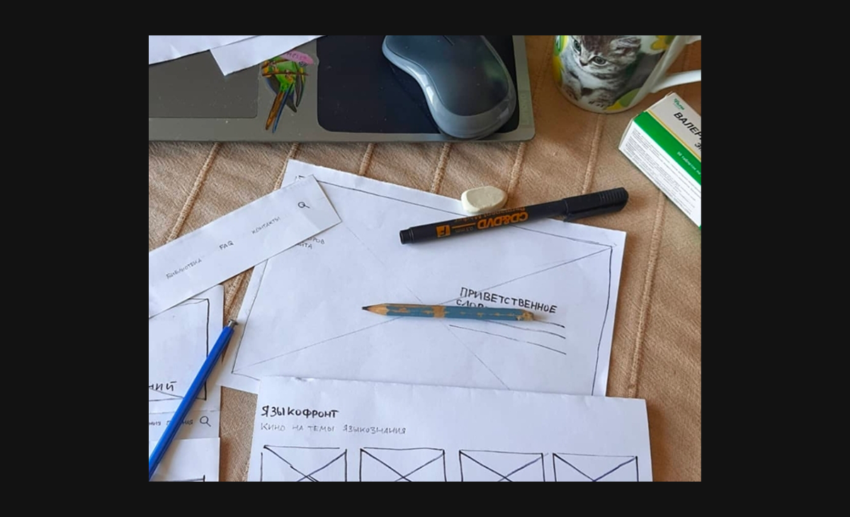 Photo: Paper prototypes used across the three rounds